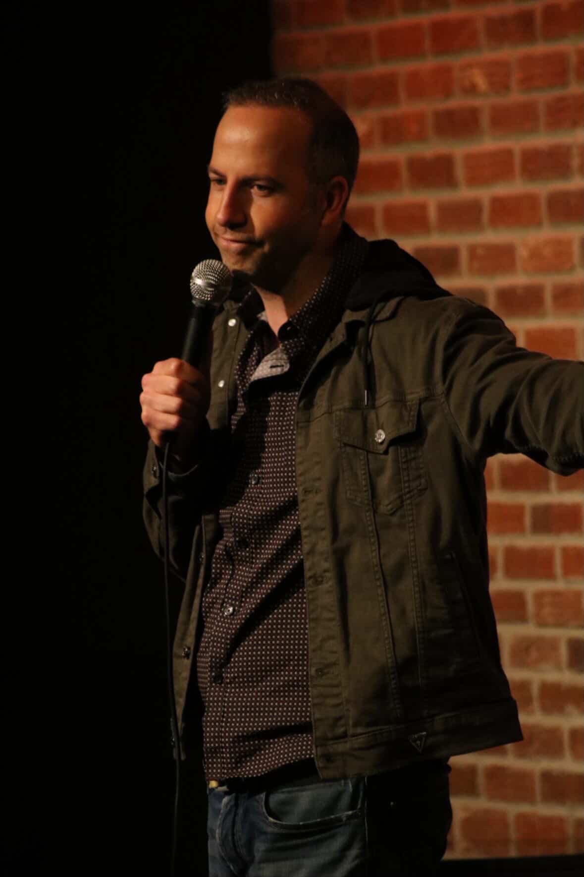 Hal Sadi performing on stage at the LOL in San Antonio